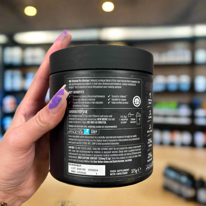 Close-up of (Applied Nutrition ABE Ultimate Preworkout 315g) held up inside My Supplement Shop, clearly showing key ingredients on the packaging in a Sports Nutrition setting.