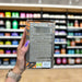 Close-up of (Grenade Thermo Detonator Weight Management Supplement Tub of 100 Capsules) held up inside My Supplement Shop, clearly showing Nutritional Values on the packaging in a Sports Nutrition setting.